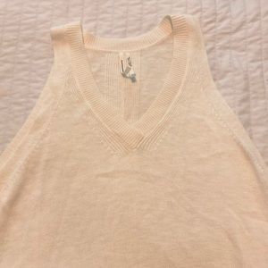 Cream colored lightweight sleeveless sweater